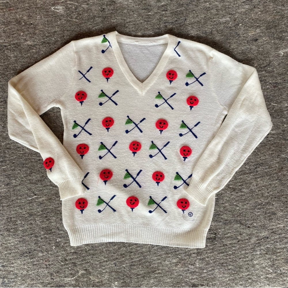 Vintage cream v-neck sweater golf graphic stitching